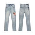 AMIRI Light Blue Patch Detail Slim Tapered Jeans